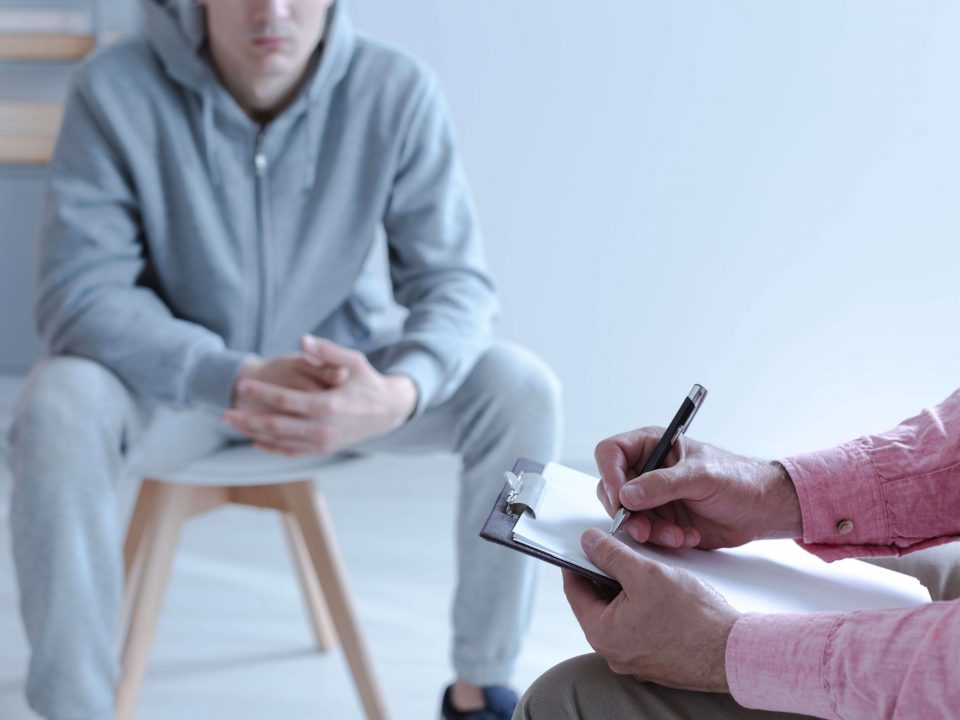 man working with a therapist on creating a relapse prevention plan