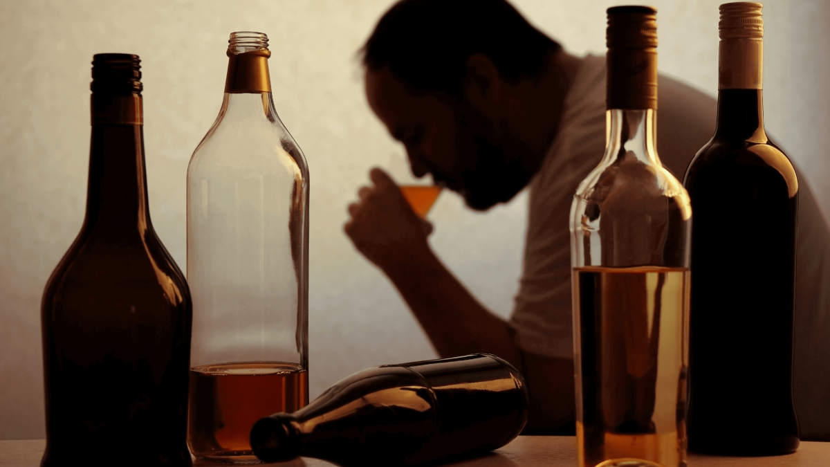 alcoholic man binge drinking
